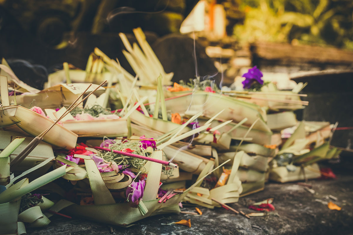 Inviting Happiness Home - The wealth of morning offerings outside a Balinese temple